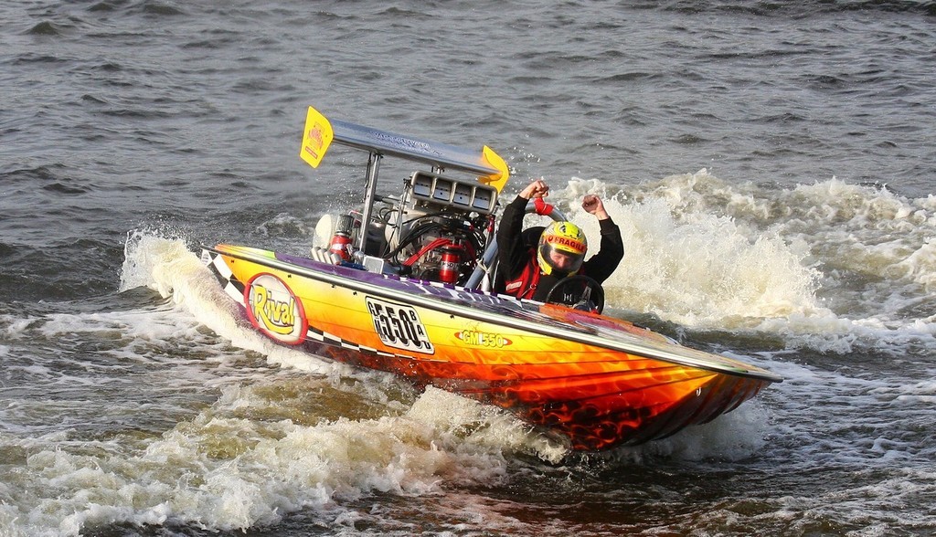 It’s a safe bet to describe ’Rival’ pilot John Cross as relatively pleased at his victory in the Iron Nuts Shield. - Bundy Thunder © Wayne Johnstone